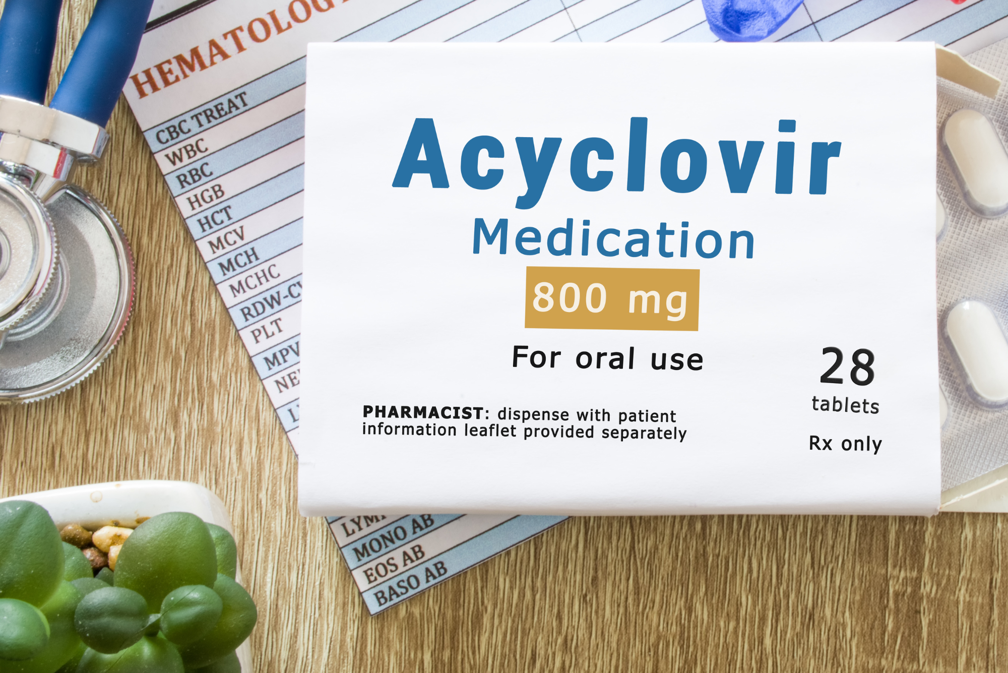 A plant sitting next to a box of acyclovir on a tabletop represents natural alternatives to acyclovir.